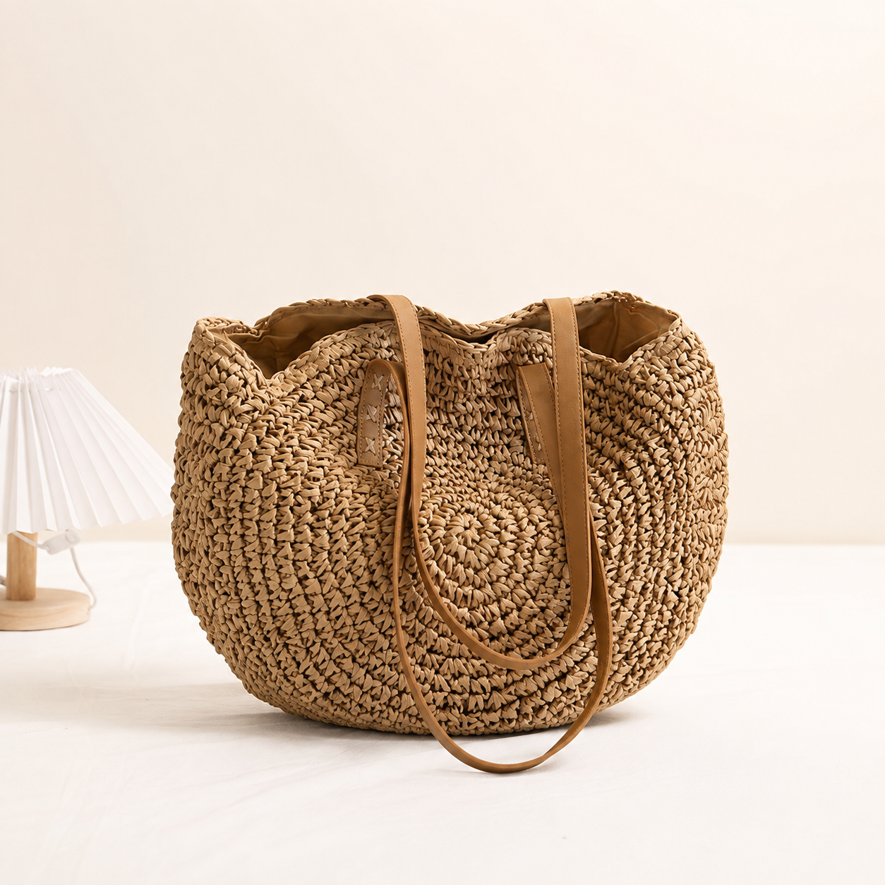 Linda -  Bolso redondo de paja trenzada