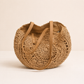 Lola - bolso redondo de paja trenzada