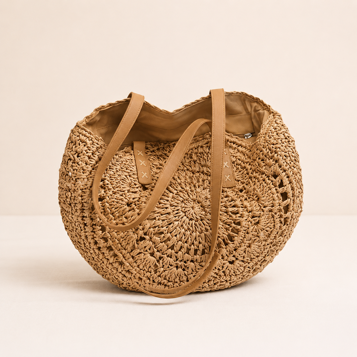 Lola - bolso redondo de paja trenzada
