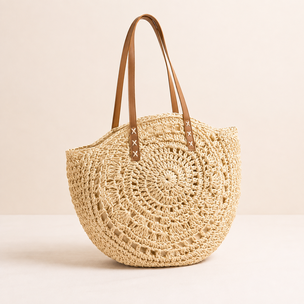 Luci - Bolso redondo de paja trenzado