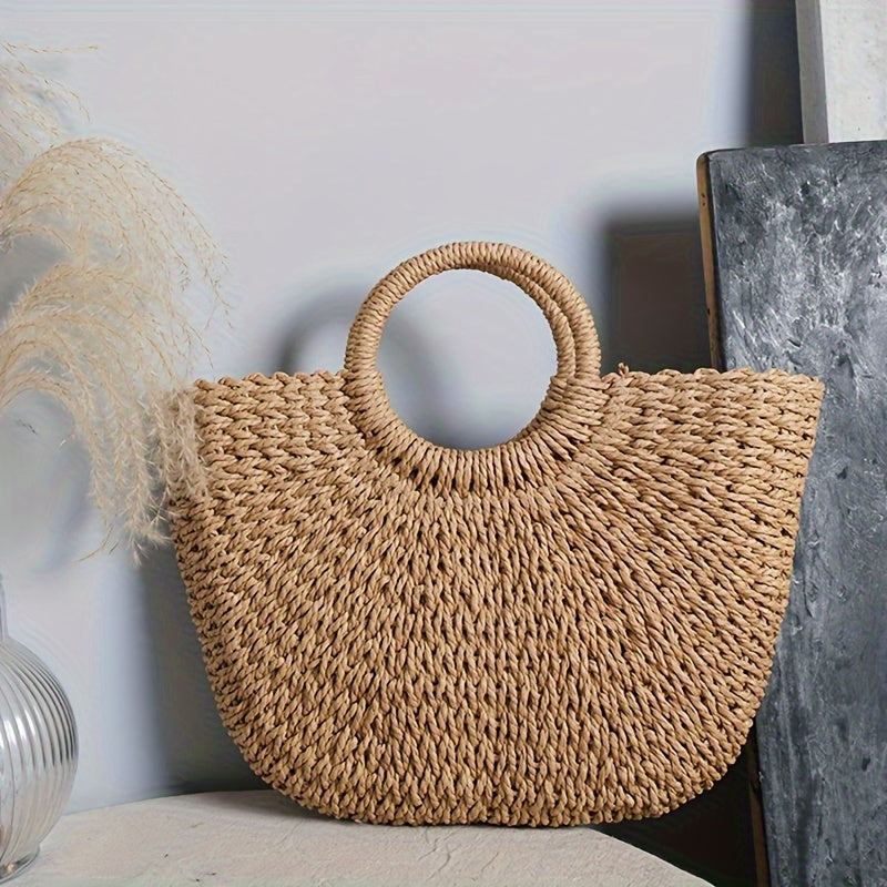 Serenella - bolso en forma de media luna de paja trenzada